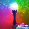 A glowing bubble ball against a vibrant rainbow background, showcasing the Flashing Bubble Wand Ball Style toy.